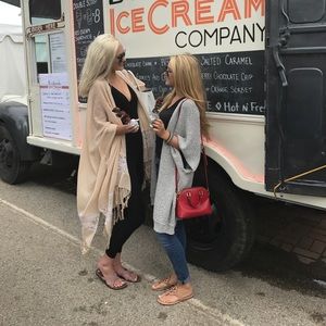 Grey sleeveless cardigan